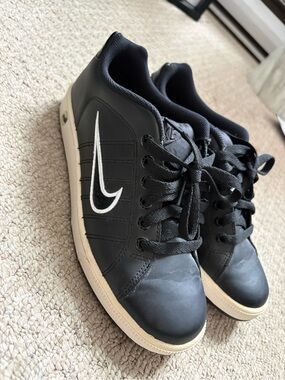 Nike Black Leather Sneakers with White Swoosh